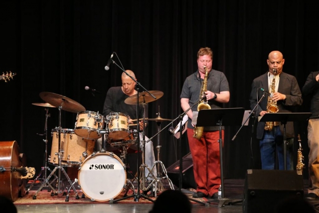 Jae Sinnett performing with members of Subject to Change in 2014